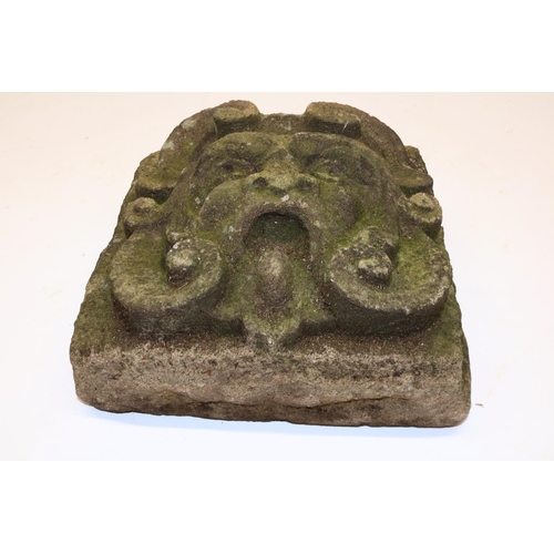 1386 - Gothic carved sandstone plaque, relief modelled as an open-mouthed man, 24cm x 24cm