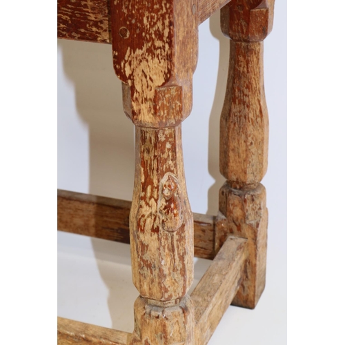 1372 - Robert Mouseman Thompson of Kilburn - an oak joint type stool, nailed rectangular adzed dished top o... 