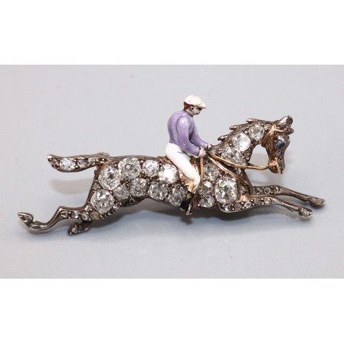 1000 - Victorian diamond-set horse and jockey brooch, the enamel jockey riding a white and yellow metal jum... 