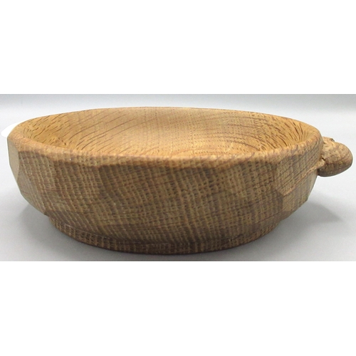 1375 - Robert Mouseman Thompson of Kilburn - an oak circular nut bowl, carved with signature mouse, D15.5cm