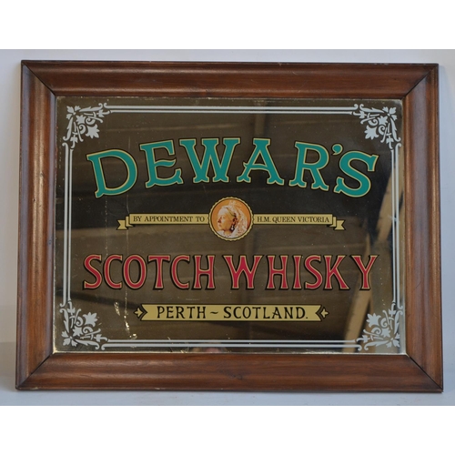 132 - Two decorative mirrors to include Dewar's Scotch Whiskey (81.7x64cm) and Winchester Repeating Arms (... 