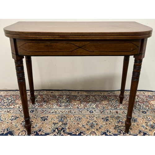 1349 - Regency mahogany D shaped tea table, with ebonised stringing and detail, folding top on twin gate ac... 