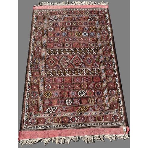 1292 - 20th century Persian wool rug, geometric multi-coloured field within repeating border, W115cm W186cm