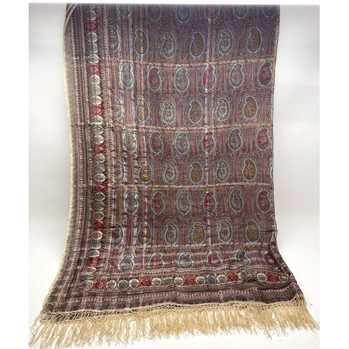 1287 - Victorian red ground polychrome Paisley shawl, traditional pattern in repeating border with fringe, ... 