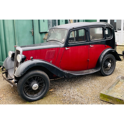 Classic 1935 Morris 8 saloon in red/black finish. 885cc petrol, historic classification, 4 door, reg: VN 7073, reverse open doors, mileage 88029, leather interior. The bodywork is sound but wiring needs complete renovation. Parts included with vehicle. V5 logbook included