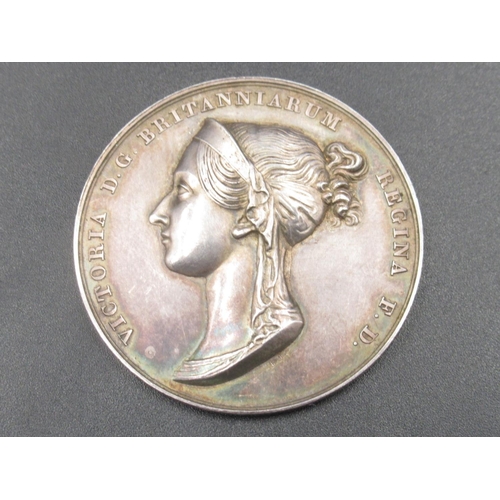 682 - Victoria, Coronation, 1838, a silver medal by B. Pistrucci, diademed bust left, rev. Victoria seated... 