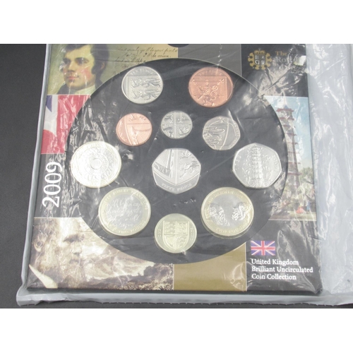 728 - A United Kingdom Royal Mint brilliant uncirculated 2009 coin year set to include the Kew Garden 50p ... 