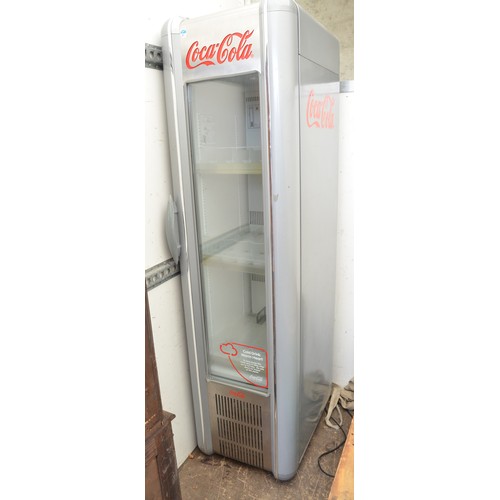 124 - Modern ex café Coca-Cola branded glass fronted fridge in working order, H189xW50xD67cm