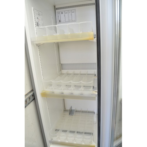 124 - Modern ex café Coca-Cola branded glass fronted fridge in working order, H189xW50xD67cm