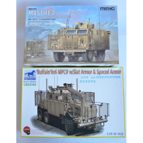 29 - Two unbuilt 1/35 scale Iraq/Afghanistan war armoured patrol vehicle plastic model kits to include Me... 