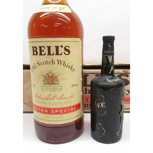 125 - Ferreira 06400 1960 vintage port, unopened, and a gallon bottle of Bells old scotch whiskey