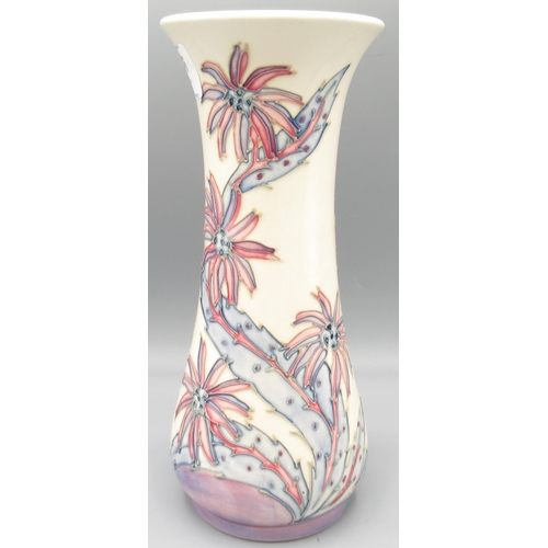 Moorcroft Pottery: 'Daisy' pattern vase designed by Sally Tuffin for M.C.C., pink and purple flowers on white ground, H21cm