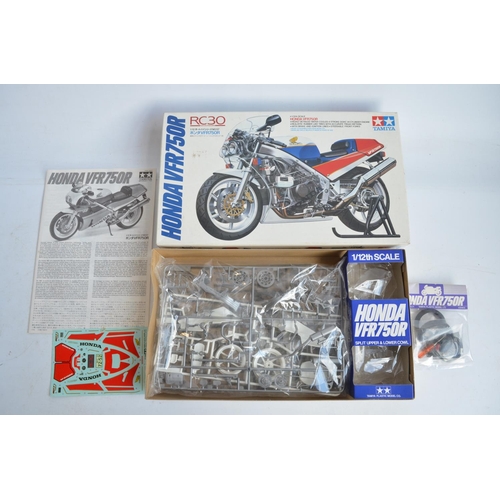 62 - Two unbuilt 1/12 scale racing Honda motorcycle plastic model kits from Tamiya to include 14077 Repso... 