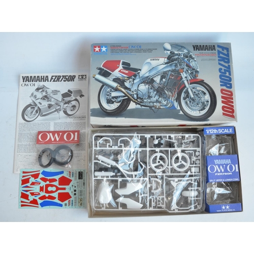 63 - Two unbuilt 1/12 scale racing Yamaha motorcycle plastic model kits from Tamiya to include 14076 Red ... 