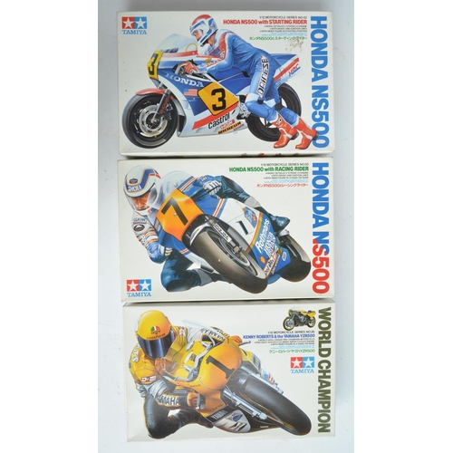 64 - Three unbuilt 1/12 scale racing motorcycle plastic model kits  with driver figures from Tamiya to in... 