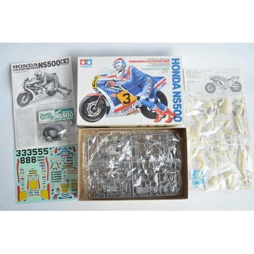 64 - Three unbuilt 1/12 scale racing motorcycle plastic model kits  with driver figures from Tamiya to in... 