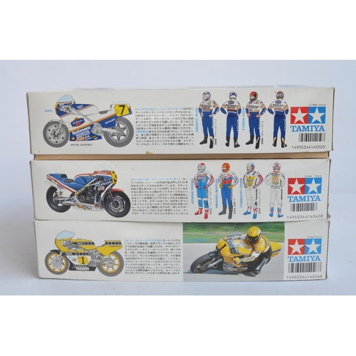 64 - Three unbuilt 1/12 scale racing motorcycle plastic model kits  with driver figures from Tamiya to in... 