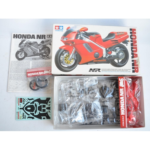 65 - Three unbuilt 1/12 scale plastic model motorcycle kits from Tamiya to include 14060 Honda NR, 1445 K... 