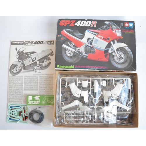 65 - Three unbuilt 1/12 scale plastic model motorcycle kits from Tamiya to include 14060 Honda NR, 1445 K... 