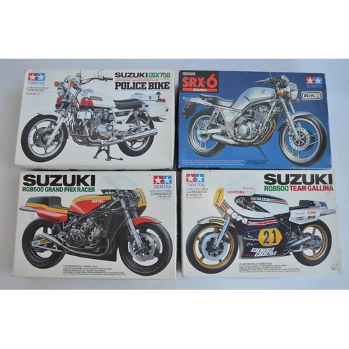 67 - Four unbuilt 1/12 scale plastic model motorcycle kits from Tamiya to include 14009 Suzuki RGB500 Tea... 