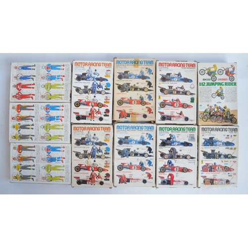 69 - Eleven boxed 1/12 scale plastic racing car and motorcycle figure sets and accessory packs from Tamiy... 