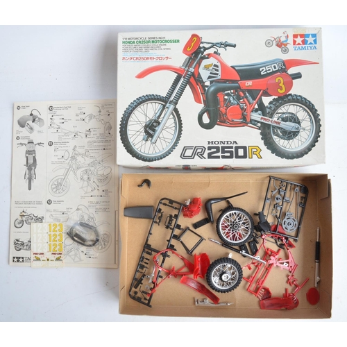 70 - Four 1/12 scale plastic model motorcycle kits from Tamiya to include 1451 KTM250MX with motocross ri... 