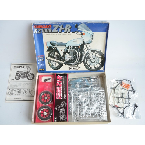 79 - Three 1/8 scale motorcycle plastic model kits, (1 partially built up) to include Nagano Kawasaki KZ1... 