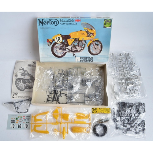 92 - Three unbuilt 1/9 scale plastic motorbike model kits from Protar (all with metal parts and frames) t... 