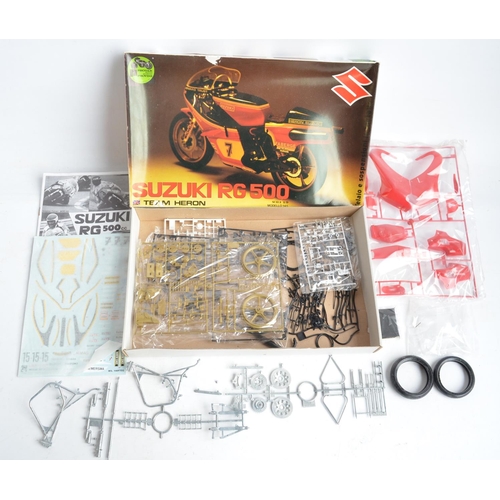 92 - Three unbuilt 1/9 scale plastic motorbike model kits from Protar (all with metal parts and frames) t... 