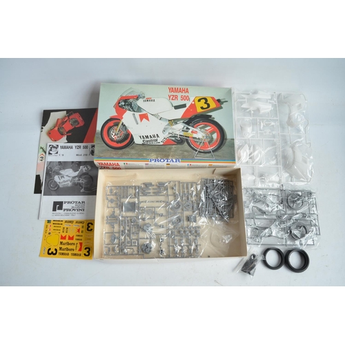 94 - Three unbuilt 1/9 scale plastic motorbike model kits from Protar to include a Suzuki RG500 Marco Luc... 