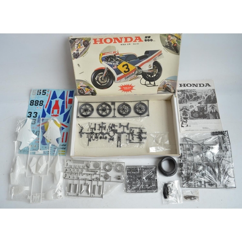 96 - Three unbuilt 1/9 scale plastic Honda NS500 motorbike model kits from Protar. Kits appear complete w... 