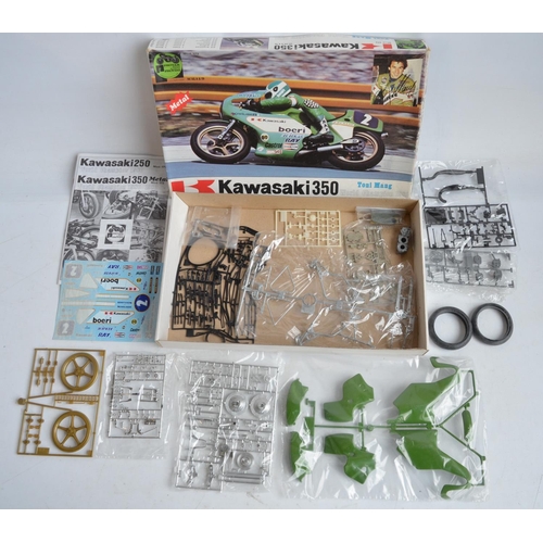 98 - Two unbuilt 1/9 scale Kawasaki plastic motorbike model kits from Protar to include a 250 Toni Mang W... 