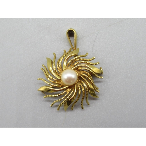 158 - Yellow metal brooch set as drop pendant, with central pearl, the bail stamped 18ct, 7.3g