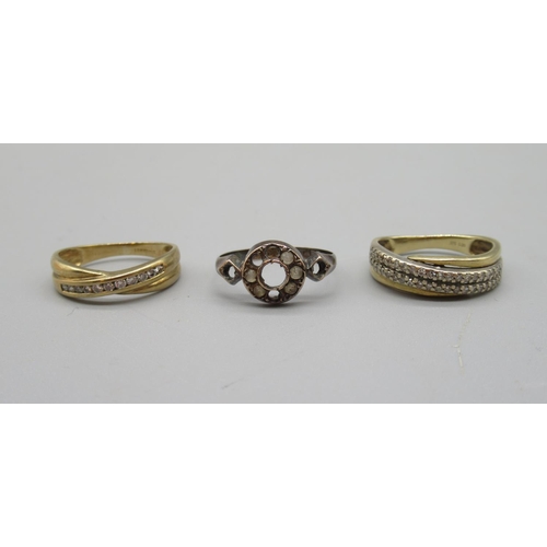 185 - 9ct yellow gold double row diamond ring, size M1/2, another similar, size L, and a 9ct gold ring wit... 