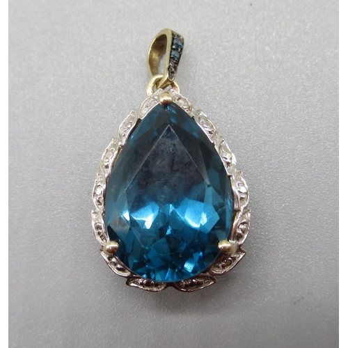 210 - 9ct yellow gold London blue topaz and blue diamond pendant, limited edition 1/50, 4.6g