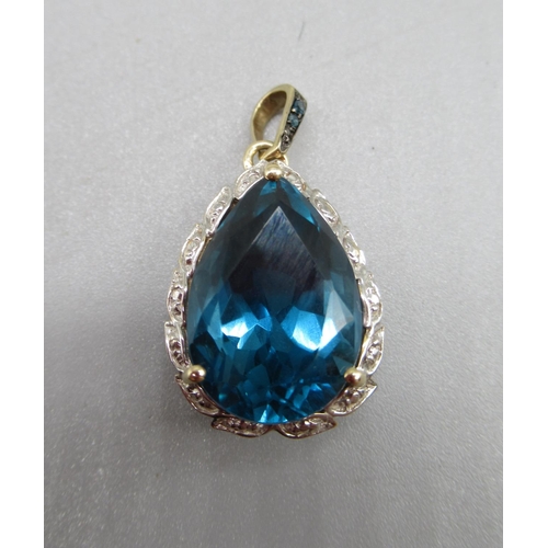 210 - 9ct yellow gold London blue topaz and blue diamond pendant, limited edition 1/50, 4.6g