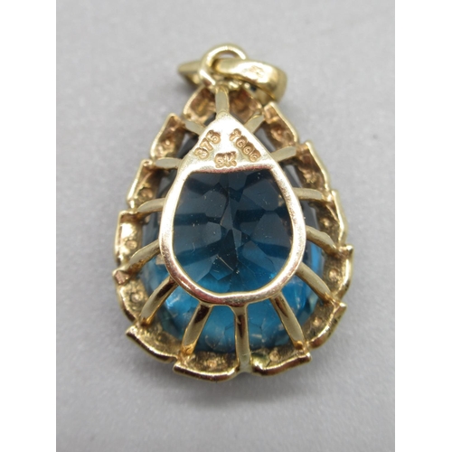 210 - 9ct yellow gold London blue topaz and blue diamond pendant, limited edition 1/50, 4.6g