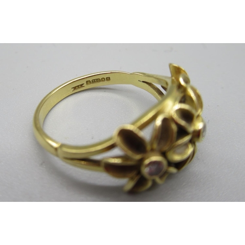 213 - 18ct yellow gold floral ring by Ann Smith, set with three diamonds, stamped 750, 4.5g