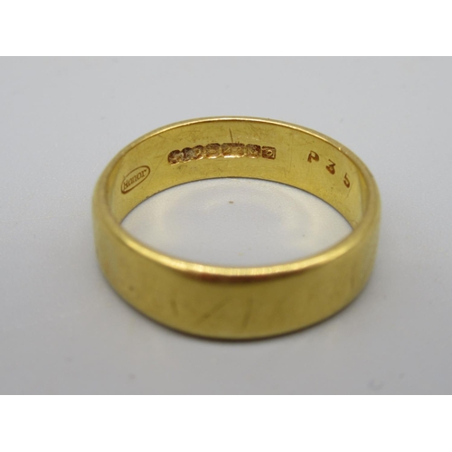 811 - 22ct yellow gold band ring, stamped 22, size P, and a scrap piece of 22ct gold, 7.8g