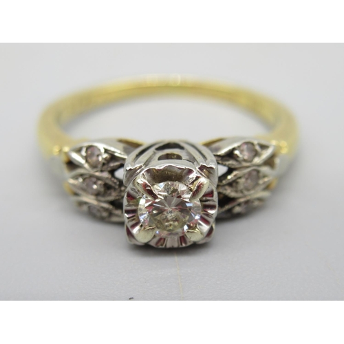 12 - 18ct yellow gold diamond ring, the round cut central diamond in white gold square mount, on triple r... 