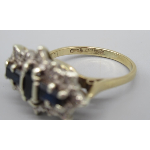 15 - 9ct yellow gold sapphire and diamond ring set with three baguette cut sapphires surrounded by brilli... 