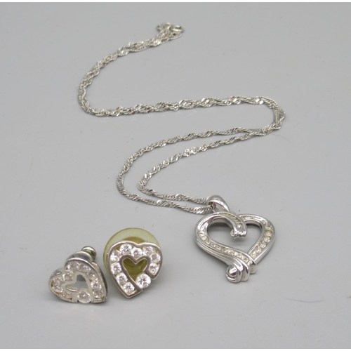 17 - 9ct white gold heart pendant on chain necklace, set with diamonds, stamped 375, 4.9g and a pair of s... 