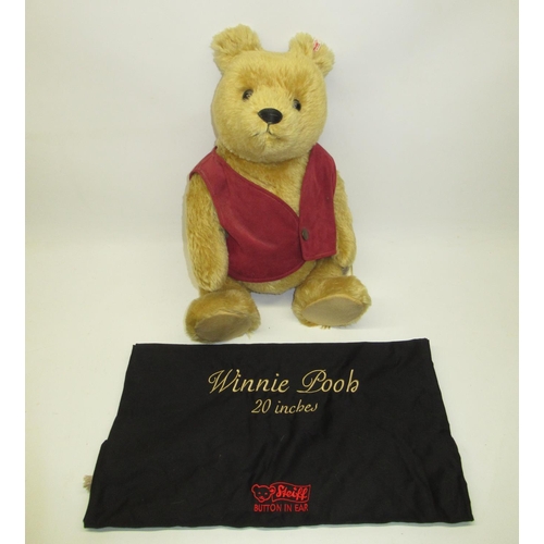 607 - Steiff: 'Winnie The Pooh' in red waistcoat, limited edition of 3500, H52cm, with dust bag