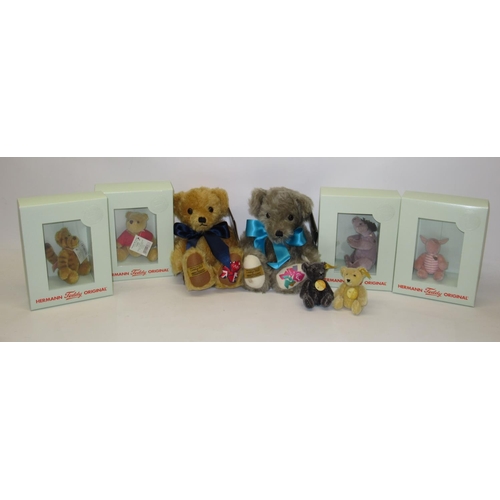 616 - Collection of soft toys and teddy bears, comprising four Hermann 'Winnie the Pooh' miniature soft to... 