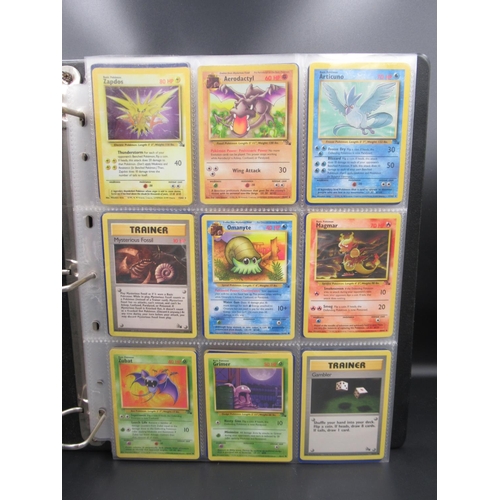 164 - Two Pokemon trading card folders containing approx. 175 cards c1999 and c2000