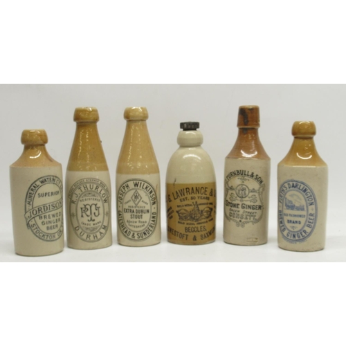 357 - Collection of early 20th century stoneware ginger beer and stout bottles, predominantly North East b... 