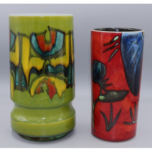 364 - Poole Pottery vases: Delphis design vase, decorated in green, yellow and blue, and a Himalayan Poppy... 