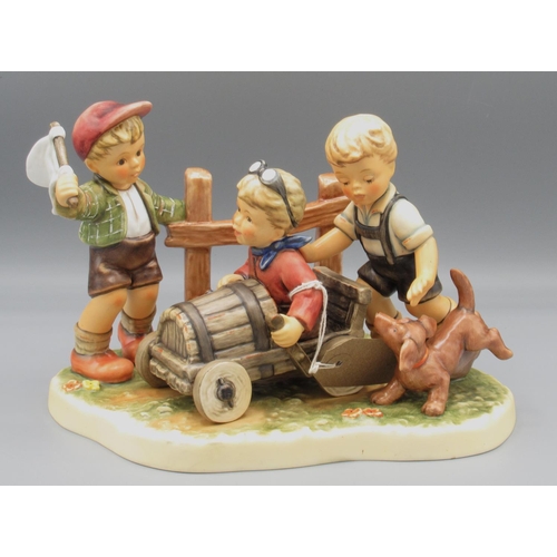 368 - Hummel Goebel, Moments in Time Collection figural group 'Soap Box Derby', L25cm