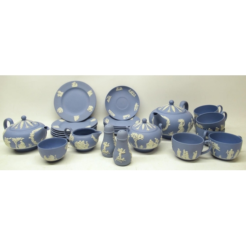 380 - Wedgwood blue Jasperware teaware, incl., two teapots, cups and saucers, sugar bowl with cover, etc. ... 