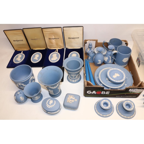 382 - Large collection of Wedgwood blue jasperware incl. two clocks, two pairs of candlesticks, four table... 